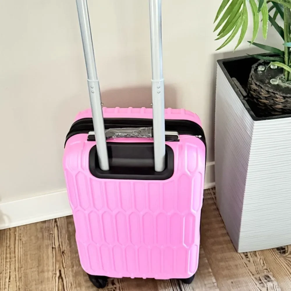 AMKA Honeycomb 20 in. Carry-On Expandable Spinner Suitcase luggage pink